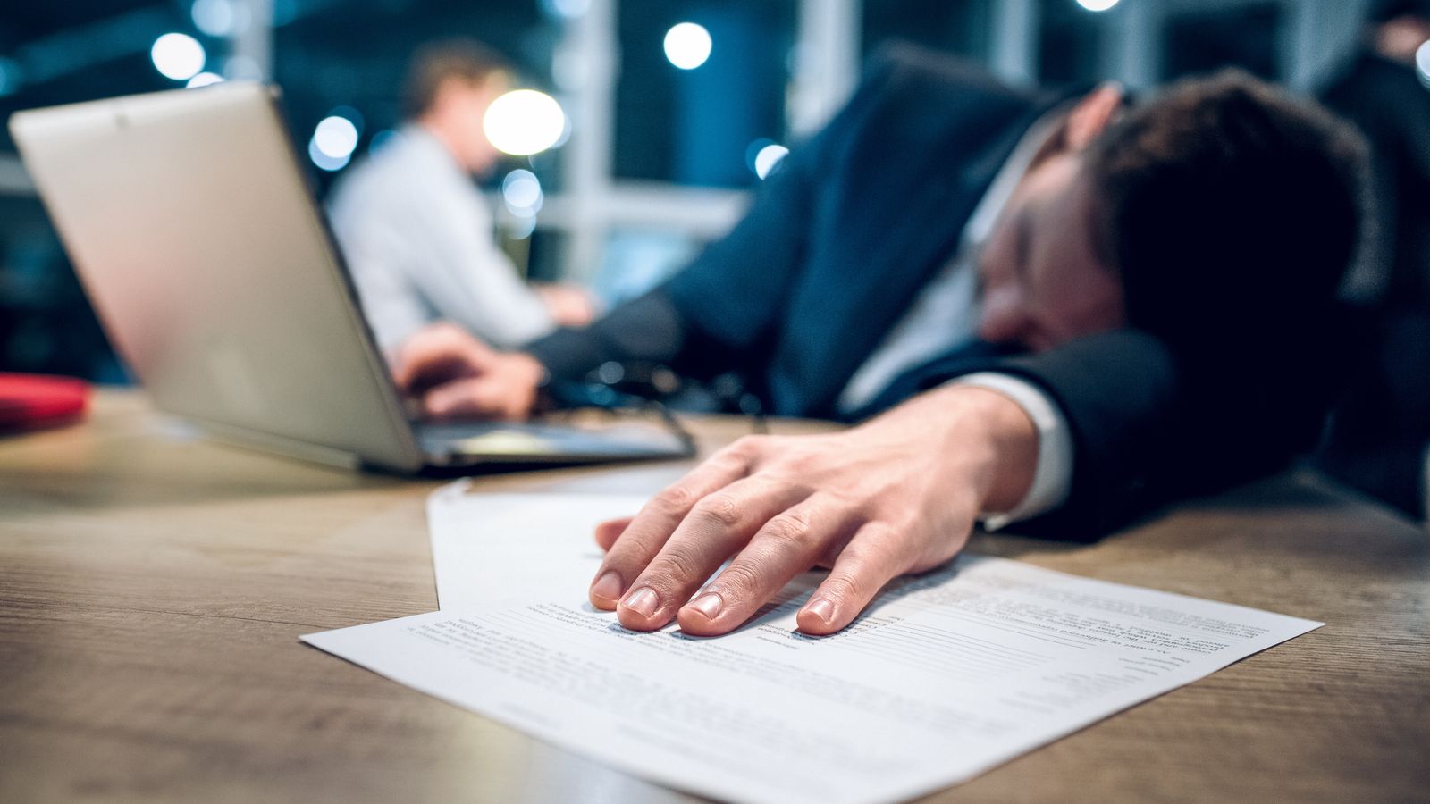 Businessman burned out from working late