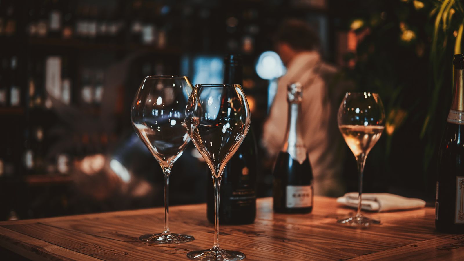 empty wine glasses on bar